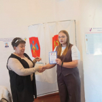 Вместе с правнуком пришли на выборы супруги Красиловы в станице Нижегородской